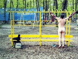 Self crucified suspended naked in public park
