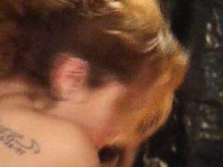 Two gorgeous lesbians sharing a huge dildo in a girly